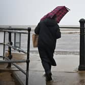 Heavy rain is set to hit Sussex and Surrey – with flooding of some homes and businesses ‘likely’. (Photo by PAUL ELLIS/AFP via Getty Images)