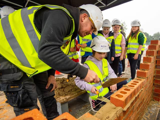 Students were shown how to lay bricks at Bellway’s Elizabeth Square development in Worthing.