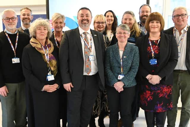Members of the QVH Board of Directors wearing the QVH Progress Pride lanyards and badges. Picture: submitted