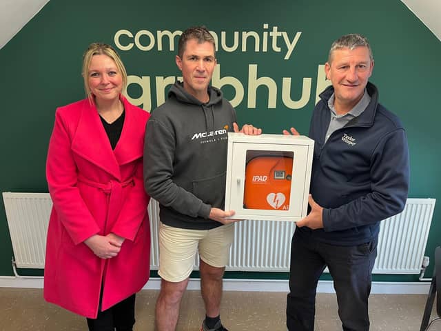 Rushmoor Borough Council Cabinet Champion, Lisa Greenway pictured with Steven Baxendale, Director at the Grub Hub and Taylor Wimpey's Simon Wakerley, Construction Manager at Admiral Park