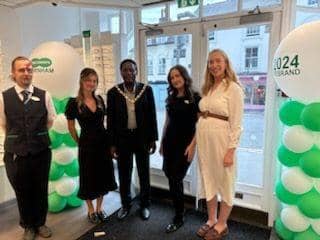 Farnham Mayor, Brodie Mauluka with the Farnahm optical and audiological team