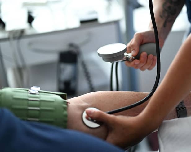 More than 350 nursing assistants – employed by Surrey and Sussex Healthcare NHS Trust – will take part in 72 hours of strike action, beginning today (Monday, August 5), according to UNISON, one of the UK's largest trade unions. (Photo by INA FASSBENDER/AFP via Getty Images)