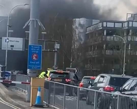 Black smoke seen from the road near Gatwick. Photo: Still from video/UGC