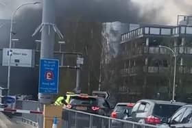 Black smoke seen from the road near Gatwick. Photo: Still from video/UGC