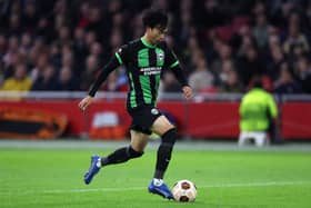 Kaoru Mitoma of Brighton & Hove Albion in action during the UEFA Europa League 2023/24 match between AFC Ajax and Brighton & Hove Albion at Johan Cruijff Arena on November 09, 2023 in Amsterdam, Netherlands. (Photo by Dean Mouhtaropoulos/Getty Images)