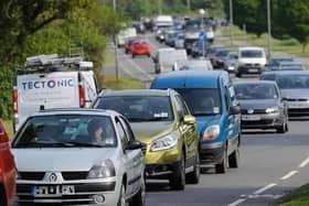 A 15 vehicle collision has closed the M23 in both directions as police have urged public to avoid the area.