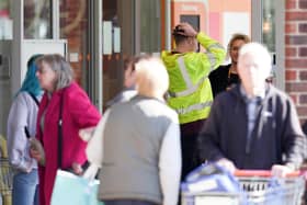 People are queueing for cash points outside Sainsbury’s stores in Sussex after a major IT fault, which has prevented card payments.