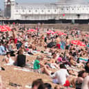 People enjoying the glorious Sussex sunshine on Brighton's beach. Photo: Sussex News and Pictures