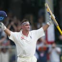 Graham Thorpe of England celebrates reaching his century during day two of the 3rd Test match between the West Indies and England at the Kensington Park Oval cricket ground, on April 2, 2004, in Bridgetown, Barbados.  (Photo by Tom Shaw/Getty Images)
