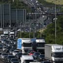 Motorists are being reminded to allow extra time or find an alternative route this weekend as work to lift the final section of a new footbridge across the M25 in Surrey takes place as a part of National Highways £317 million upgrade of junction 10, helping to connect local communities. Picture by JUSTIN TALLIS/AFP via Getty Images