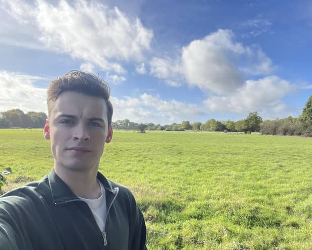 Cllr Josh Brown near former green belt land earmarked for housing (image supplied by Cllr Josh Brown)