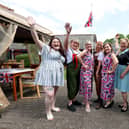 Team members in their themed outfits celebrating VE Day