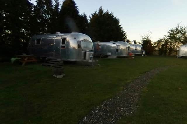 View inside Happy Days Retro Vacation caravan site, with aluminium covered caravans. (Credit: Google Street View)