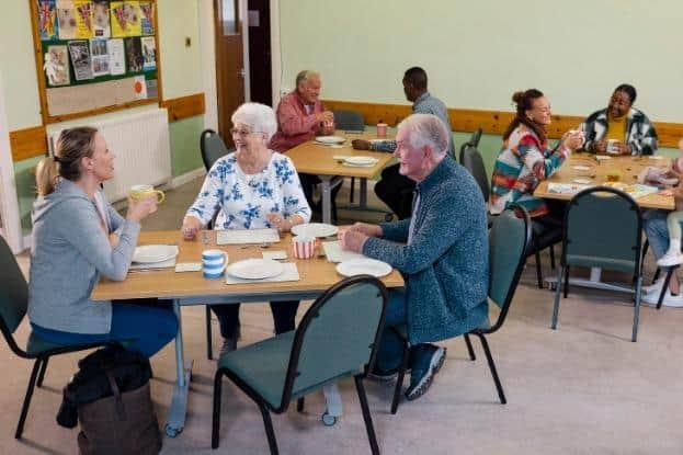 Image of people enjoying a community centre. (Credit: Elmbridge Borough Council)