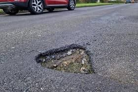 New research by claims.co.uk has named the local authorities in England which received the most additional budget per mile for repairing potholes. Photo: Sussex World