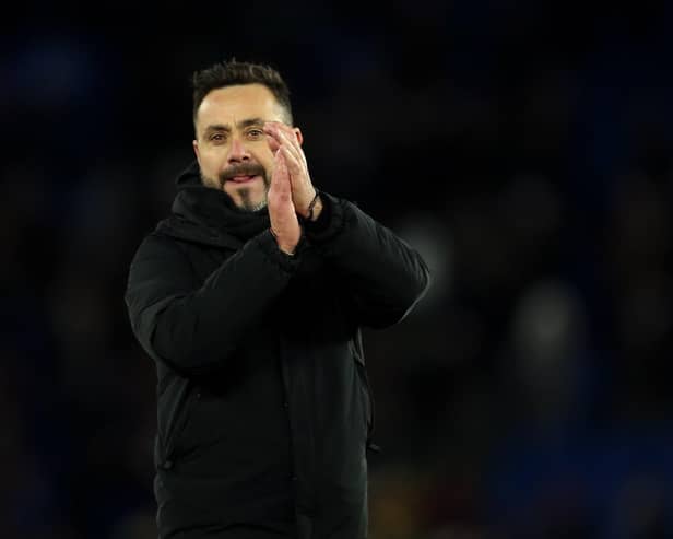 Roberto De Zerbi, Manager of Brighton & Hove Albion, applauds the fans after the team's victory in the Premier League match between Brighton & Hove Albion and Brentford FC at American Express Community Stadium on December 06, 2023 in Brighton, England. (Photo by Steve Bardens/Getty Images)