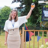 Jan Daly, the Registered Manager at The Redcot Arms with a Fruit Punch - ready to welcome visitors
