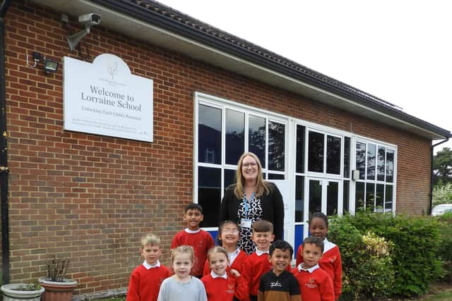 Headteacher Karen Ney with pupils.