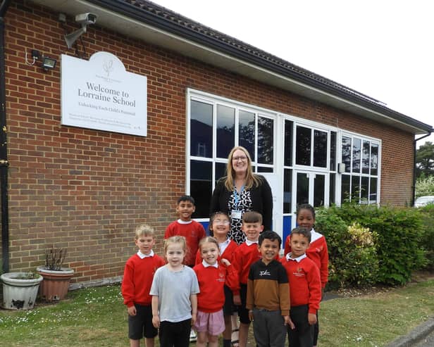 Headteacher Karen Ney with pupils.