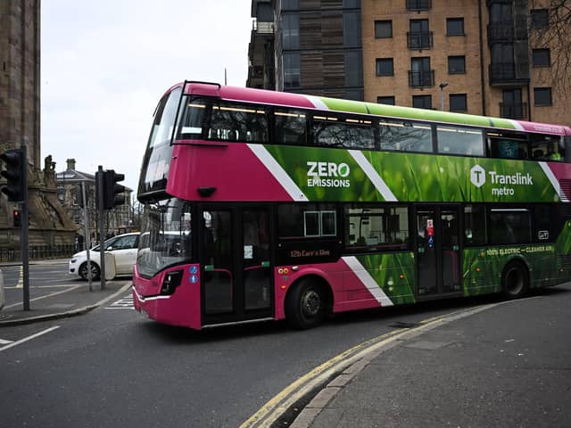 A zero emissions double decker bus is driven in central Belfast, Northern Ireland, on March 19, 2024. (Photo by PAUL ELLIS/AFP via Getty Images)