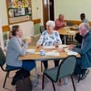 Image of people enjoying a community centre. (Credit: Elmbridge Borough Council)