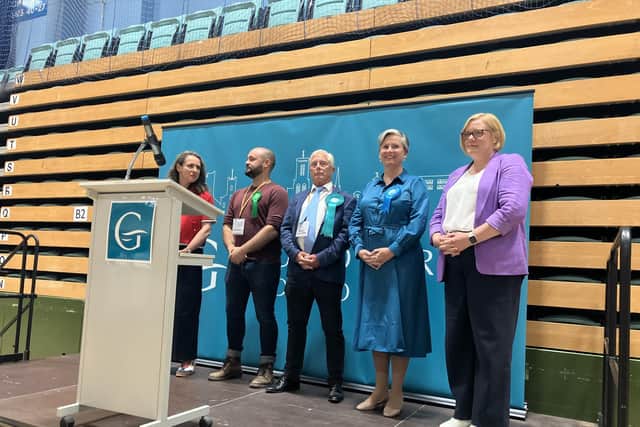 Candidates waiting for the election result. (From left to right: Labour Sarah Gillinson, Green Sam Peters, Reform UK Dennis Saunders, Conservative Angela Richardson, Lib Dem Zoe Franklin). (Credit: Emily Dalton/LDRS)