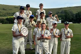 Horley's happy Under-12s celebrate their Bowl victory.