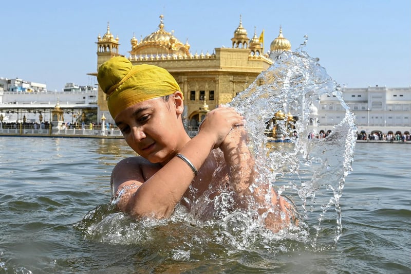 Air India flies to Amritsar (Photo by NARINDER NANU/AFP via Getty Images)