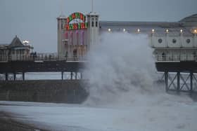 Multiple trees and power cables have blocked roads across the country, flood warnings are in place and people have been told to not travel by train 'unless absolutely necessary'. Photo taken in Brighton by Eddie Mitchell