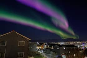 TOPSHOT - Northern lights are seen over Tromsoe on November 2, 2022. (Photo by Rune Stoltz Bertinussen / NTB / AFP) / Norway OUT (Photo by RUNE STOLTZ BERTINUSSEN/NTB/AFP via Getty Images)