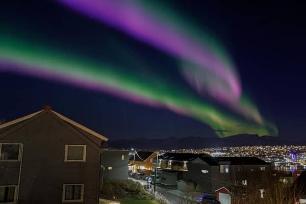 TOPSHOT - Northern lights are seen over Tromsoe on November 2, 2022. (Photo by Rune Stoltz Bertinussen / NTB / AFP) / Norway OUT (Photo by RUNE STOLTZ BERTINUSSEN/NTB/AFP via Getty Images)