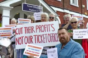Residents outside St Leonards Warrior Square protest against the planned closure of thousands of railway ticket offices
