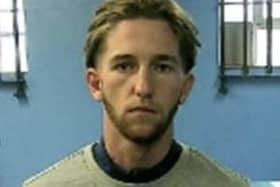 Police are appealing for the public’s help in finding 21-year-old Miles Smith, who is wanted on recall to prison. Picture courtesy of Surrey Police