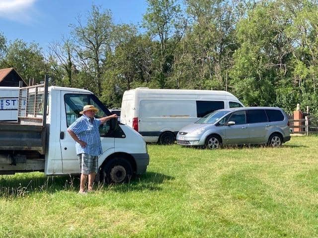 William Lewis In His Field With Cars For Ukraine. (Credit Christine Godfrey)
