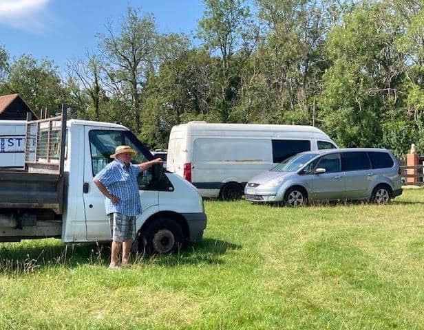 William Lewis In His Field With Cars For Ukraine. (Credit Christine Godfrey)
