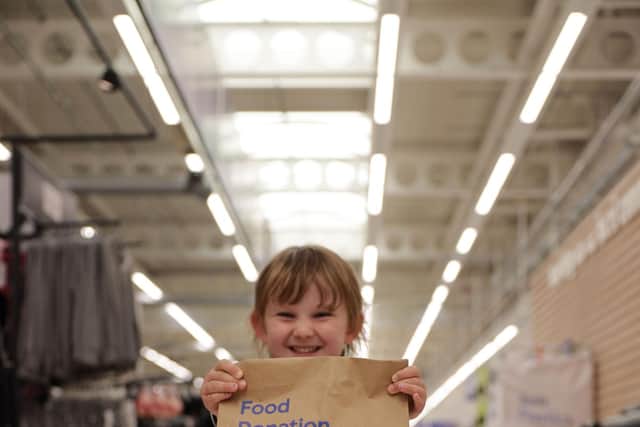 Donation bags are available so that Surrey shoppers can make a difference to the lives of children and their families.