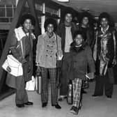 Michael Jackson and his brothers, Jackie, Tito, Marlon and Jermaine - the Jackson Five, at Heathrow Airport.   (Photo by George Stroud/Getty Images)