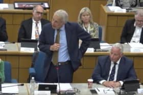 Cllr Mike Rollings as new leader of Elmbridge Council (middle), deputy council leader Cllr Simon Waugh (right) and Cllr Gill Coates (left). (Credit Elmbridge Borough Council meeting webcast)
