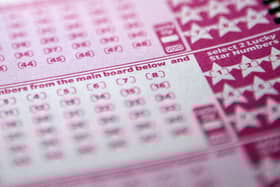 A mystery man, known only as Mr T, has won £10,000 a month for one year after matching the five main numbers in the Set For Life draw on Monday, January 26. Picture by SHAUN CURRY/AFP via Getty Images