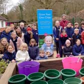 Pupils from Grayswood Primary School, nr Haslemere, get planting their own potatoes with the help of Squire’s Milford Plant Team member, Cameron.