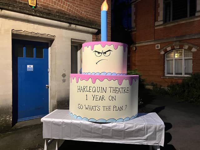 Harlequin Support Group's prop birthday cake, asking what the plan is for the theatre one year on. ((Credit: Emily Dalton/LDRS)
