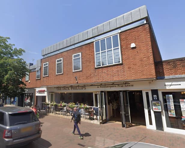 The top floors of the Godalming High Street block will be converted into flats (image Google)