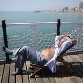 As a mini-heatwave hits Sussex and Surrey, sleep experts have share six tips to get a good night's rest. (Photo by Jordan Mansfield/Getty Images)