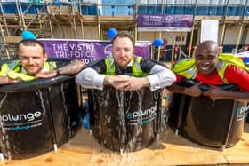 Staff from Vistry South East taking part in the ice bath challenge at the Mill View development in Pagham to raise money for SSAFA, the Armed Forces charity.