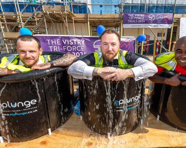 Staff from Vistry South East taking part in the ice bath challenge at the Mill View development in Pagham to raise money for SSAFA, the Armed Forces charity.