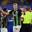Jan Paul van Hecke of Brighton & Hove Albion reacts during the Premier League match between Chelsea FC and Brighton & Hove Albion at Stamford Bridge on December 03, 2023 in London, England. (Photo by Mike Hewitt/Getty Images)