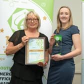 A member of the Agility Eco team accepts the Energy Efficiency award: Picture: Jason Mitchell Photography