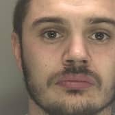 Levi, 29, of no fixed address, is wanted on suspicion of assault. Picture courtesy of Surrey Police
