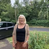 Joanne Standing Outside Her House With Thorpe Park In The Background. (Credit: Emily Dalton/LDRS)