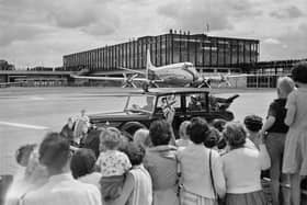 Queen Elizabeth II and Prince Philip arriving at Gatwick Airport for the official opening ceremony, West Sussex, June 9th 1958. (Photo by Evening Standard/Hulton Archive/Getty Images).